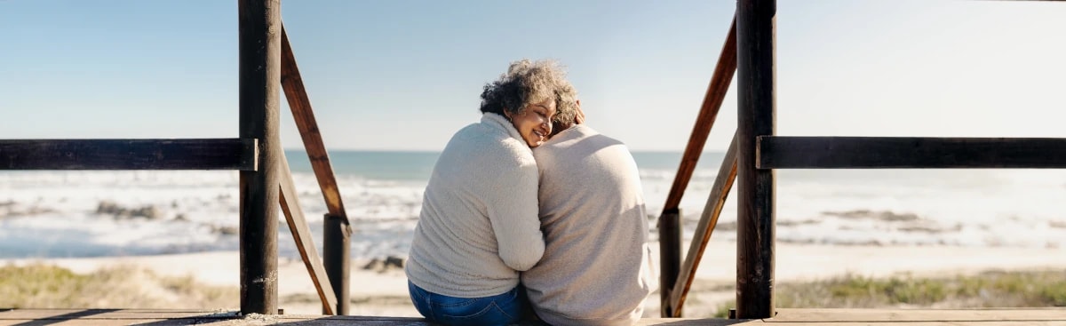 couple hugging on beach