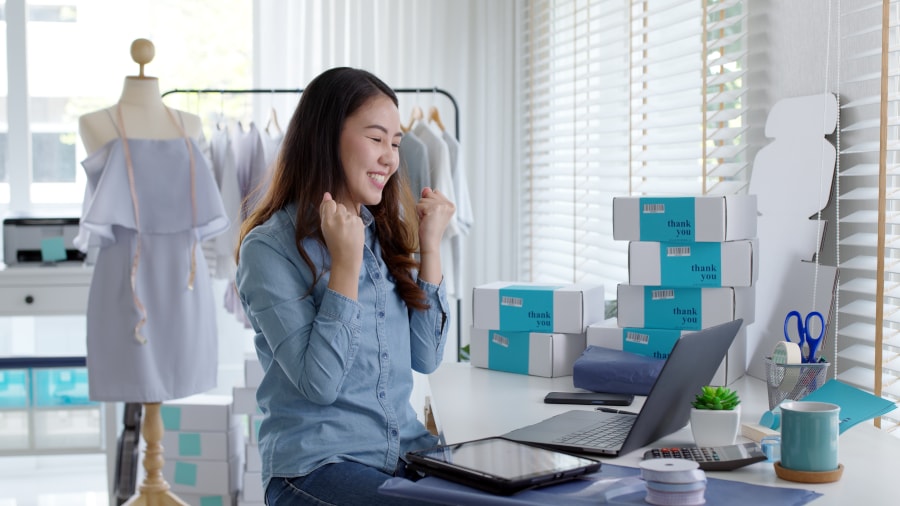 happy person on laptop