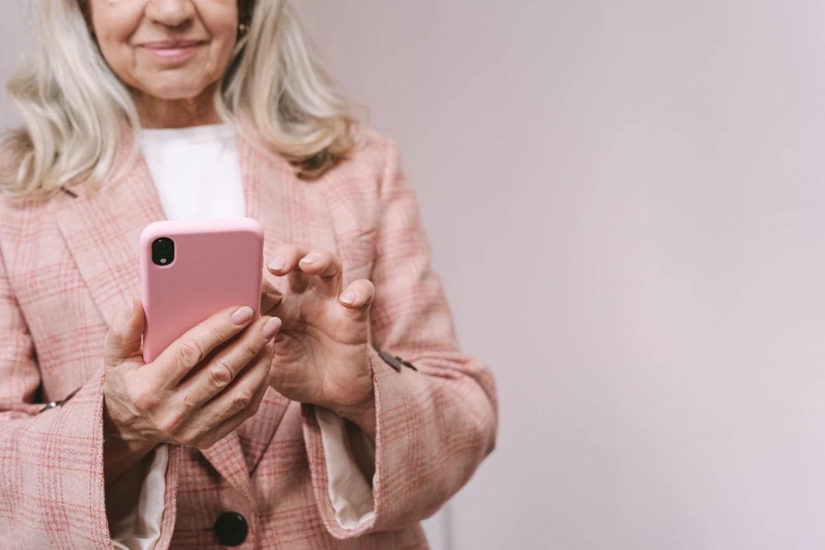 elderly woman using a smartphone
